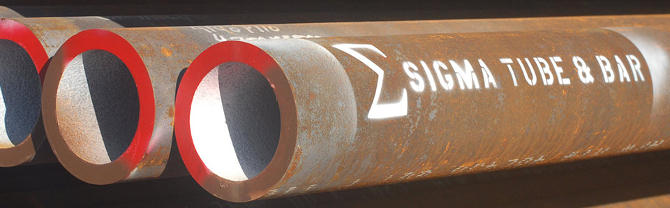 Photo of pipes with a Sigma Logo on them